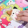 imageSquishmallows Original Sketchbook Over 20 Stationery Supplies Features Scrapbook Stickers Cam the Cat Fidget Toy Drawing Paper Great Kids Craft Coloring Books for Kids Ages 48Sketchbook